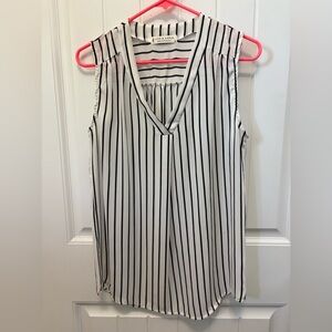 Jon & Anna Black and White Striped sheer V-Neck Blouse. Woman’s Size Medium.